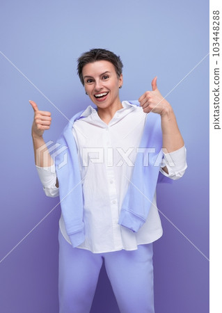 dreamy brunette short haired young woman in casual look dreamy brunette short haired young woman in casual look 103448288