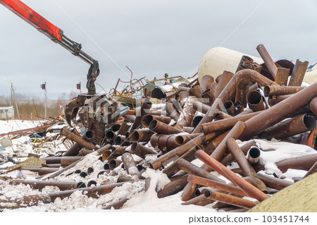 Industrial scrap metal. Waste of human activity. Scrap metal at the recycling site 103451744
