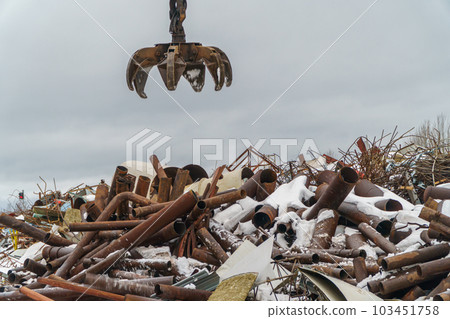 Industrial scrap metal. Waste of human activity. Scrap metal at the recycling site 103451758
