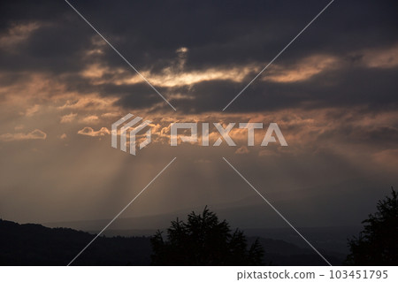 light in the cloudy sky 103451795