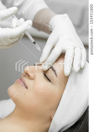 Skin renewal, where the botulinum therapy procedure makes a woman's skin young, moisturized and expressive, giving her a new freshness. Injection for wrinkle consideration and facial skin care Skin renewal, where the botulinum therapy procedure makes a woman's skin young, moisturized and expressive, giving her a new freshness. Injection for wrinkle consideration and facial skin care 103451800