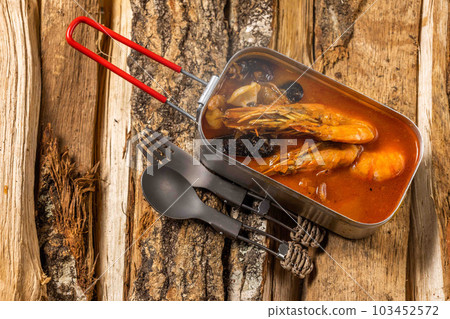 Title Food using a bonfire at the campsit 103452572