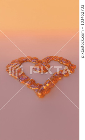A Delicate Liquid Caramel Heart Candy on Light Peach Background 103452732