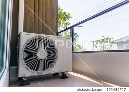 Air condition outdoor unit compressor install outside the house 103454737