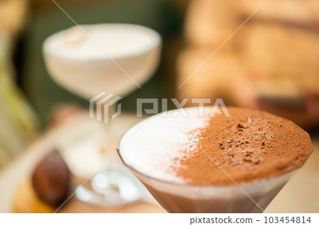 hot chocolate cocoa drinks on table in cafe 103454814