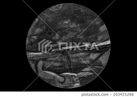 transparent adhesive round plastic sticker label isolated on black background 103455266