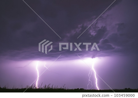 Ray. Lightning. Electric storm. Strong electrical storm with a multitude of lightning and thunder. Lightning storm over fields of Spain. Photography of lightning. 103459000