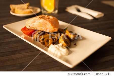 chop with potatoes and salad chop with potatoes and salad 103459710