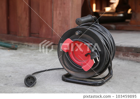 Electrical Long Extension cable cord on reel with remote socket 103459895