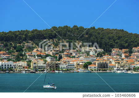 Argostolion town seafront panorama with low-rise buildings on the Ionian Island of Cephalonia Greece. 103460606