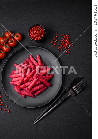 Delicious penne pasta with beets, cheese, salt and spices Delicious penne pasta with beets, cheese, salt and spices 103461013