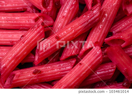 Delicious penne pasta with beets, cheese, salt and spices Delicious penne pasta with beets, cheese, salt and spices 103461014