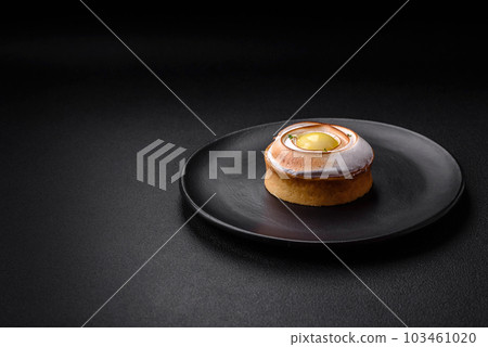 Delicious tart with citrus filling and walnut cream Delicious tart with citrus filling and walnut cream 103461020