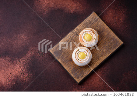 Delicious tart with citrus filling and walnut cream Delicious tart with citrus filling and walnut cream 103461058