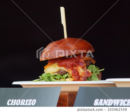 Chorizo burger at the Karlin farmers street food festival in Prague. 103462549
