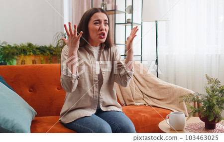 Scared woman screams from stress tension problems panic horror hopelessness fear surprise shock Scared woman screams from stress tension problems panic horror hopelessness fear surprise shock 103463025