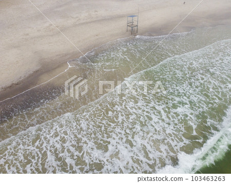 Lifeguard stand on a cloudy day at Black see beach, waves on a send 103463263