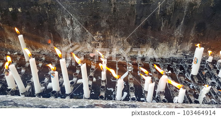 Prayers candle in one quite praying place, each candle represents the hope and spirit of the prayers, in mother Mary's praying cave 103464914