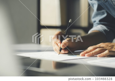 Close up of businessman working at office using laptop. Close up of businessman working at office using laptop. 103466328