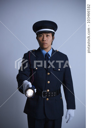 security guard with flashlight 103466582