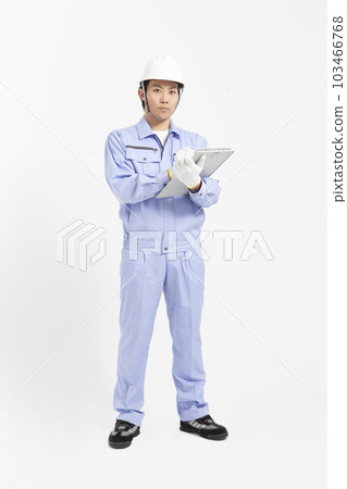 Male worker wearing a helmet 103466768