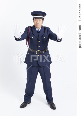 A security guard who spreads his hand and stops A security guard who spreads his hand and stops 103466866