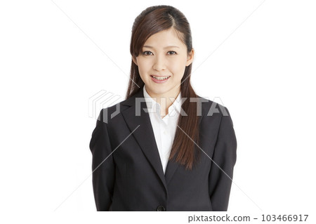 A smiling business woman in a suit 103466917