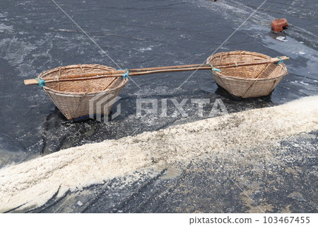 raw salt on farm with bamboo basket 103467455