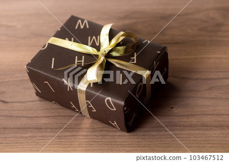 Gift ・Chic wrapping paper and gold ribbon Gift ・Chic wrapping paper and gold ribbon 103467512