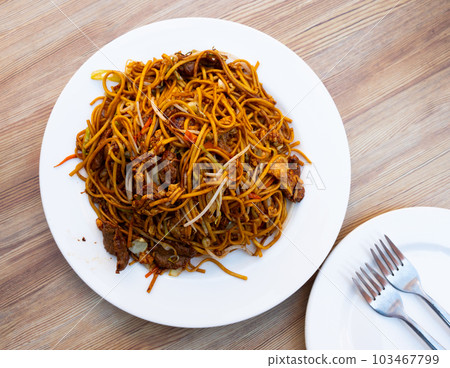 Big portion of chinese style fried noodles with beef meat Big portion of chinese style fried noodles with beef meat 103467799