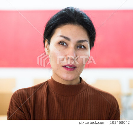 Portrait of smiling woman in audience Portrait of smiling woman in audience 103468042