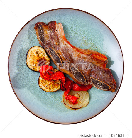 Delicious uruguayan style churrasco steak served with eggplant and pimento pepper Delicious uruguayan style churrasco steak served with eggplant and pimento pepper 103468131