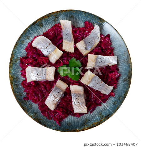On pillow of beetroot salad - pieces of lightly salted herring are arranged in circle 103468407
