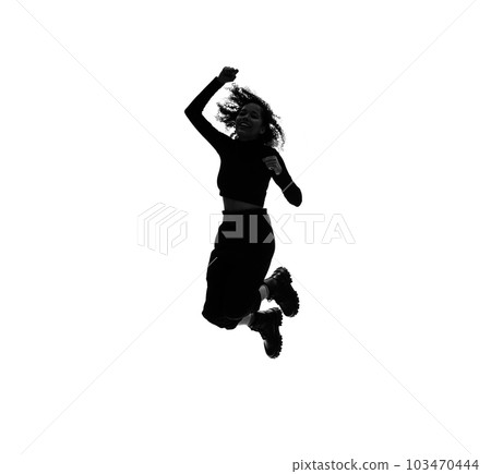 Silhouette of a foreign woman jumping 103470444