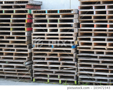 Stacked wooden forklift pallets Stacked wooden forklift pallets 103472343