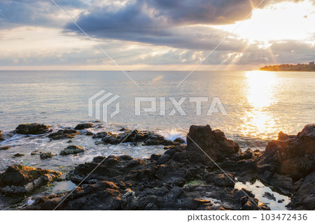 black sea scenery at sunrise. bright cloudy sky. leisure background black sea scenery at sunrise. bright cloudy sky. leisure background 103472436