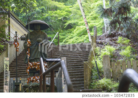 Tanukidaniyama Fudo-in Temple in Kyoto Omocha Daishi (Kobo Daishi statue) with long stone steps 103472835