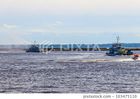 Extinguishing a burning ship during naval exercises 103475110