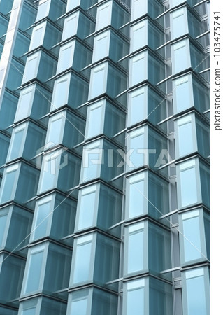 #反射和發光的建築物玻璃牆的背景材料“AI生成的圖像” 103475741