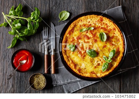 upside down pizza in baking dish, top view 103475802