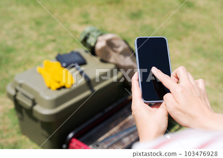 Photo of leisure equipment and mobile phone 103476928
