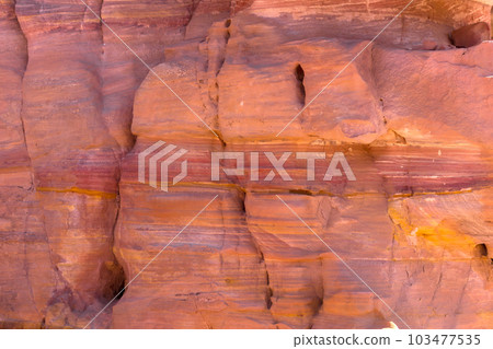 Sandstone rock and mineral layers in Petra, Jordan 103477535