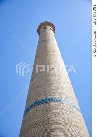 Hazrati imam comlex. Close up view of tower. Islam building in Uzbekistan. 103479081