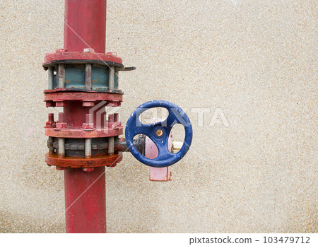 Old rusty industrial tap water pipe and valve Old rusty industrial tap water pipe and valve 103479712
