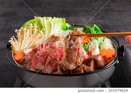Sukiyaki Cooking Meat Lifting 103479929