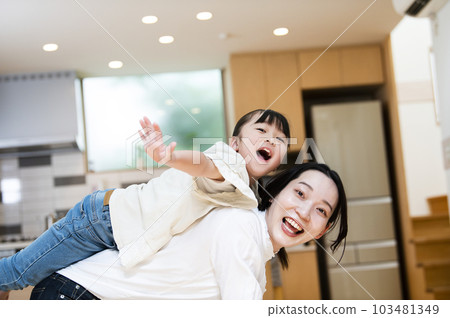 Girl playing with mom 103481349