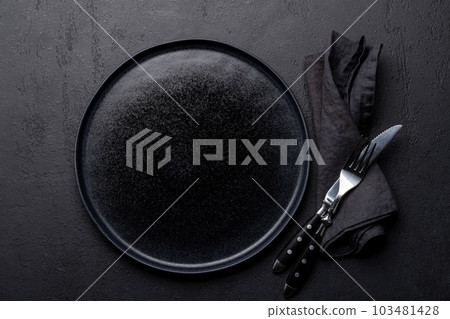 Empty plate with fork and knife 103481428