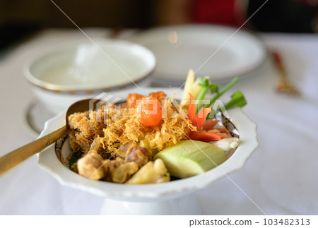 Khao chae, rice soaked in cool water served with assorted side dishes. Thai traditional summer food .. 103482313