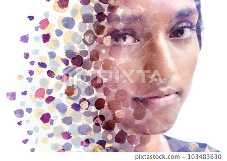 A paintography portrait of a young woman's face combined with paint dots A paintography portrait of a young woman's face combined with paint dots 103483630