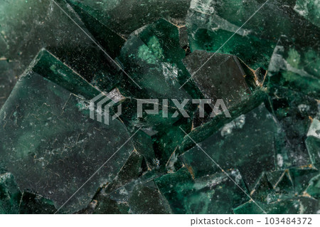 Macro mineral stone Fluorite white background 103484372
